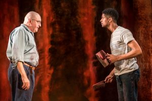 Production photo of Alfred Molina and Alfred Enoch in Red
