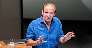 Production shot of Ralph Fiennes in David Hare's play Beat The Devil at the Bridge Theatre in London