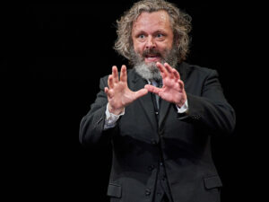 Production photo of Michael Sheen in Faith Healer at the Old Vic theatre in London