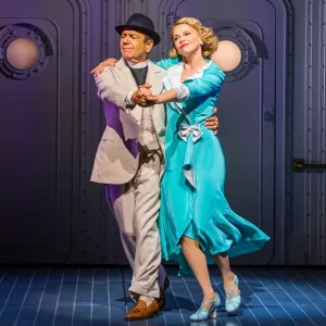 Prtoduction photo of Robert Lindsay and Sutton Foster in Anything Goes at The Barbican Theatre in London