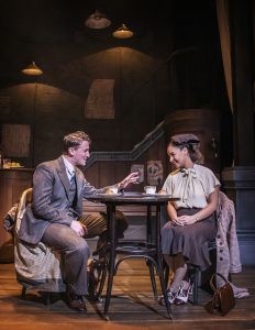 Production photo of Callum McIntyre & Laura Lake Abedisi in Brief Encounter at The Watermill Theatre in Newbury