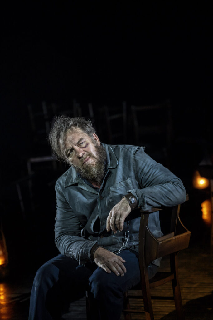 Production photo from The Crucible at the National theatre London in 2022 showing Brendan Cowell