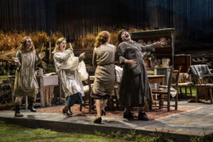 Actors dancing on stage in a production of Dancing At Lughnasa at the National Theatre London in April 2023